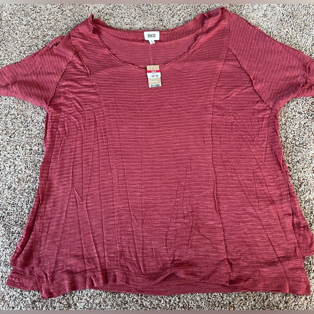 BKE TOP. SIZE SMALL. BURNT RED AHORT SLEEVES. NWT
